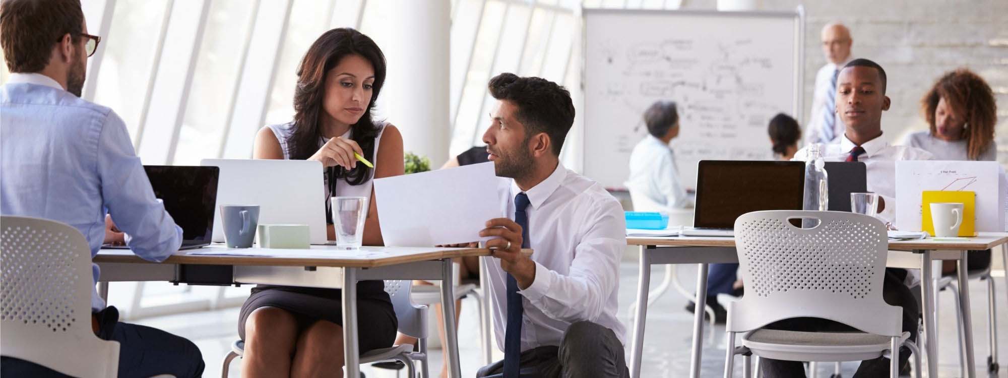 Business colleagues communicating in an office